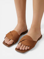 Women’s Minimalist Flat Sandals with Textured Cross Strap Design
